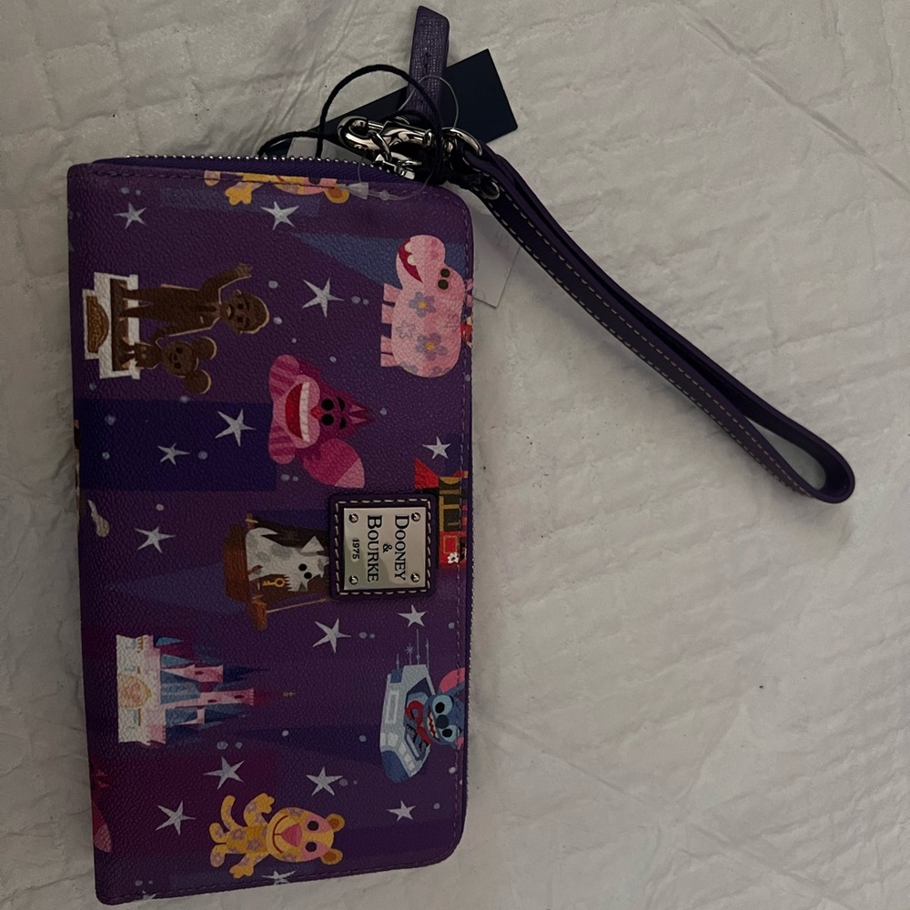 NWT. Disney Dooney & Bourke wallet by Joey Chou wristlet